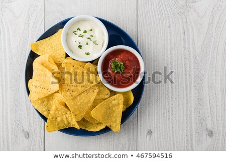 Plate Of Nachos With Sour Cream And Salsa Stock photo © 3523studio