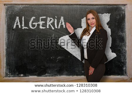 Teacher Showing Map Of Algeria On Blackboard [[stock_photo]] © vepar5