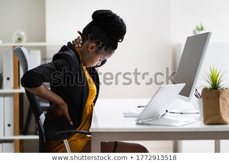 Stock photo: Back Pain Bad Posture Woman Sitting