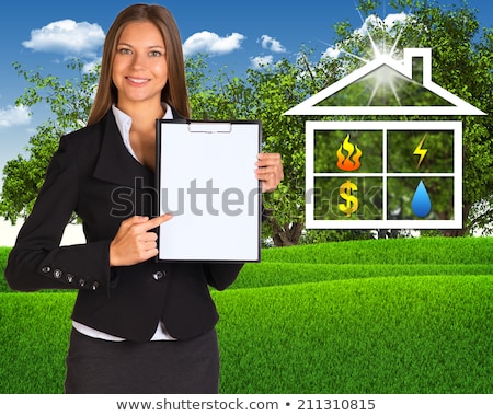 Businesswoman Holding Empty Paper House And Nature Landscape Stockfoto © cherezoff