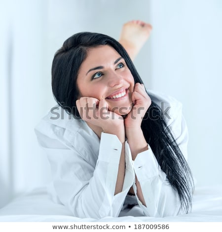 Stock photo: Carefree And Confident In Herself Wearing Mans Shirt
