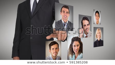 Foto stock: Man Touching On Profile Pictures Of Business Executives