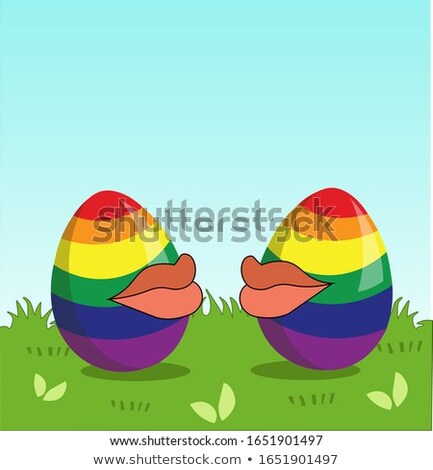 Foto d'archivio: Two Eggs Are Colored In The Colors Of The Rainbow As A Flag Of Gays And Lesbians As Well As Easter E