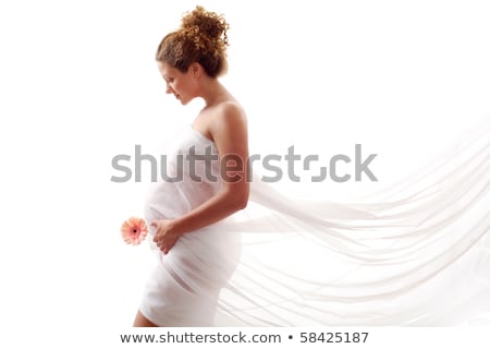 Çiçekler ile oldukça hamile kadın portresi Stok fotoğraf © Pressmaster