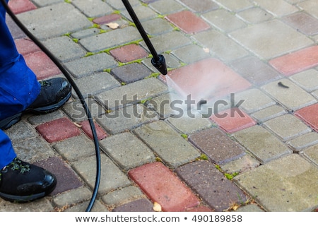 Stock fotó: Pavement Cleaning With High Pressure Washer