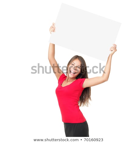 Cheerful Young Woman Holding Billboard With Arm In Air Stock fotó © Ariwasabi