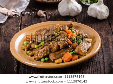 Stock photo: Pork Medallions With Vegetable And Soy Garlic Sauce