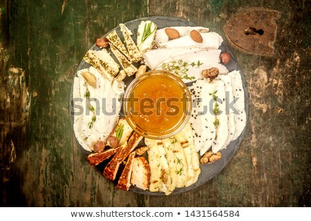 Foto stock: Honey And Cheeses On A White Plate Food