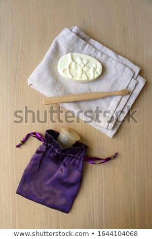 [[stock_photo]]: Feminine Hygiene Product - Menstrual Cup On A Wooden Background