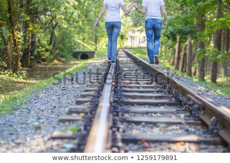 ストックフォト: Standing Along The Rail