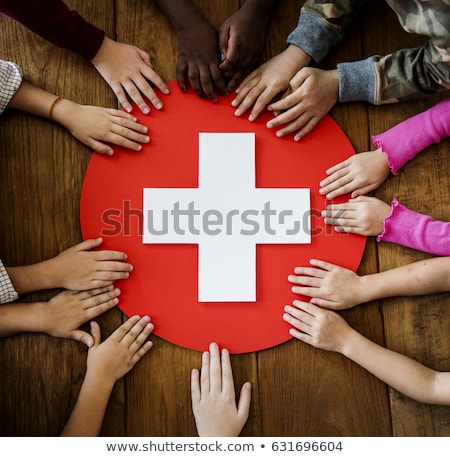 Stok fotoğraf: Person Holding Red Cross