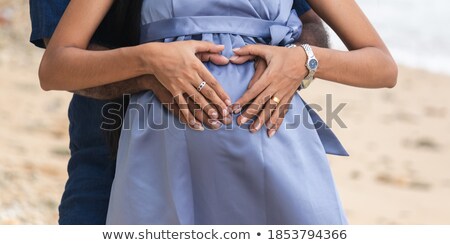 Stock photo: A Couple In Front Of The Big Heart