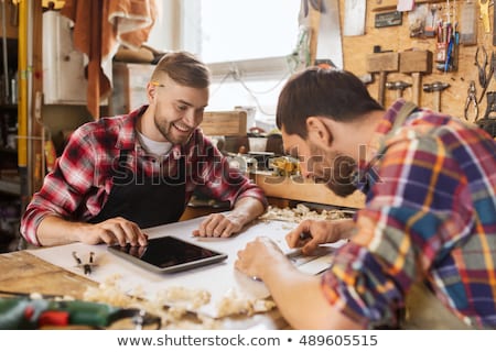 Stockfoto: Workmen With Tablet Pc And Blueprint At Workshop