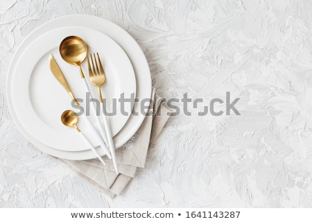 Stok fotoğraf: Close Up Of Fork Knife And Spoon On Table