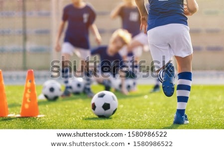 Kids In Soccer Teams Kicking Ball On Sports Venue ストックフォト © matimix