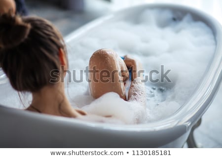 Stock photo: Young Woman Relaxing In A Sauna