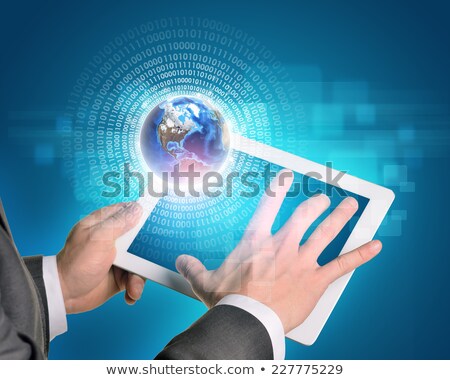 Man Hands Using Tablet Pc Earth And Figures Near Computer Stockfoto © cherezoff