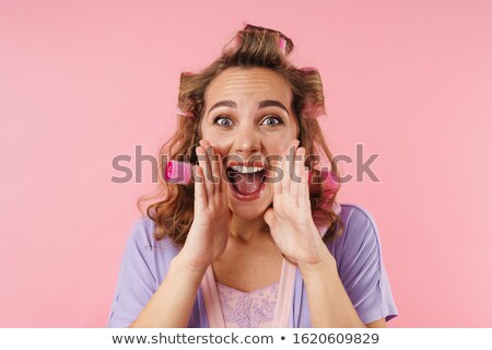 Stock photo: Image Of Young Excited Woman In Curler Screaming At Camera