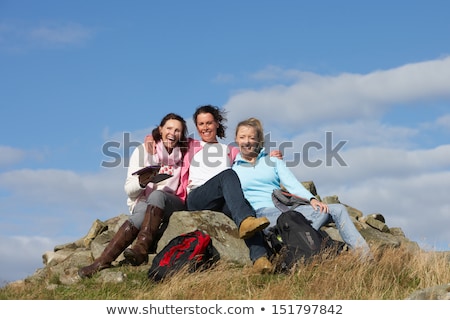 Stock photo: Group Of Women Stopping For Lunch On Countryside Walk