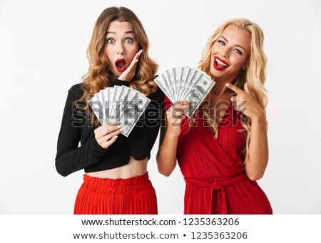 Stock photo: Portrait Of Two Shocked Young Smartly Dressed Women