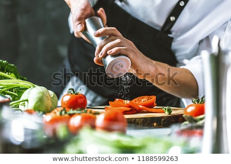 Stock fotó: Male Cook Preparing Food In The Kitchen