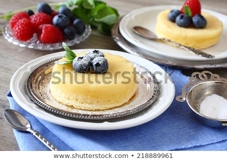 Сток-фото: Delicious Lemon Pudding Cake Served With Berries