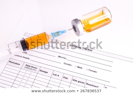 Foto d'archivio: Syringe Vial And Injection Tracker