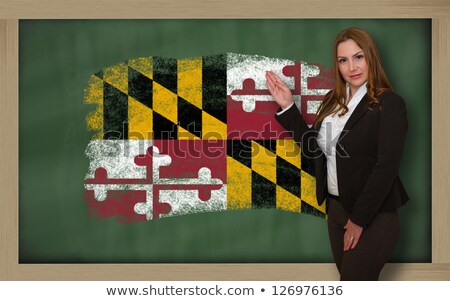 Teacher Showing Flag Ofmaryland On Blackboard For Presentation M [[stock_photo]] © vepar5