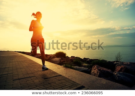 Stock photo: Female Jogger Exercising Outdoors