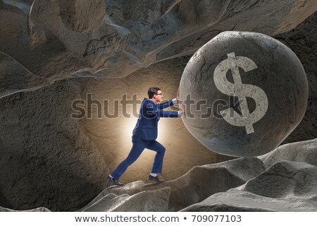 Działalności człowieka pchanie znak dolara Zdjęcia stock © Elnur