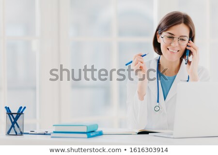 Zdjęcia stock: Photo Of Glad Woman Therapist Or Physician Has Phone Conversation With Patient Gives Advice How To