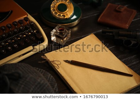 [[stock_photo]]: Retro Spy Agent With Revolver