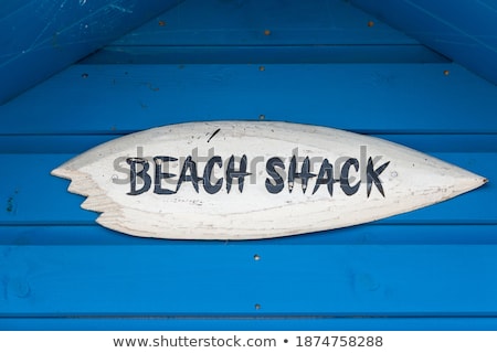 Stock fotó: Wooden Hut With Sign On Top