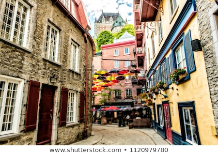 Foto stock: Lot Of Umbrellas In Petit Champlain Street Quebec City Canada