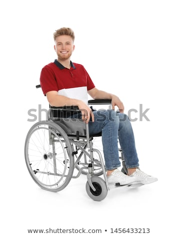 Сток-фото: Young Handsome Man In Wheelchair At The Hospital