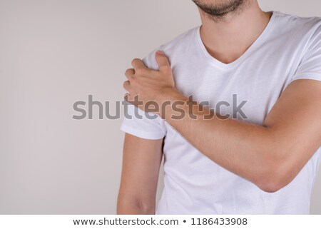 [[stock_photo]]: Man Suffering From Acute Pain In Shoulder