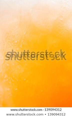 Natural Gradient Of Iced Orange Juice And Drops Stock foto © nalinratphi