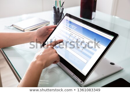 Stock fotó: Businessperson Filling Online Survey Form