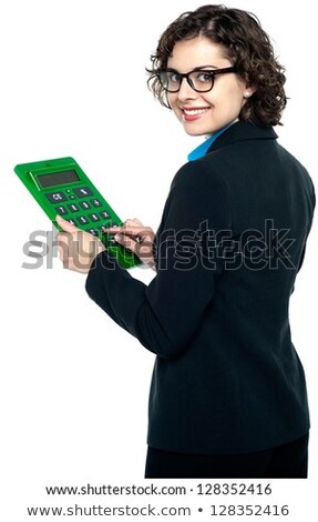 Stockfoto: Bespectacled Entrepreneur Holding Calculator