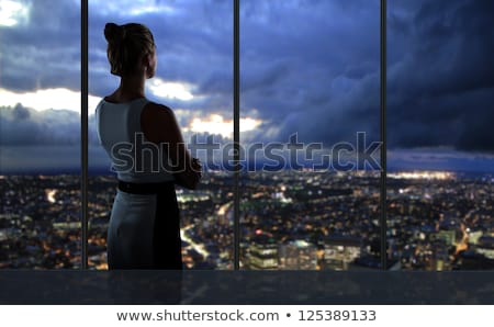 Stock photo: Woman Looking At Night City