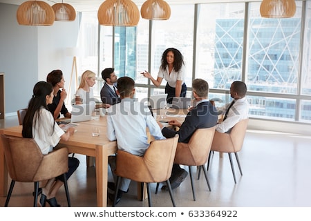 Foto stock: Business People Are Working In Office Presentation In Front Of