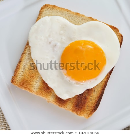 Stok fotoğraf: Colored Squares With Fried Eggs