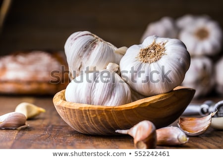 Stock fotó: Garlic Press And Cloves Of Garlic