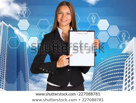 Businesswoman Holding Paper Holde Building And Hexagons With Icons Stockfoto © cherezoff