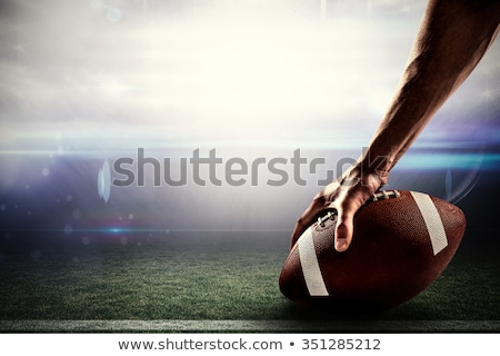 Foto stock: Composite Image Of Sports Player Holding Ball