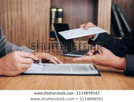 Hand Of Employer Filing Final Remuneration After Employee To Wri Stock foto © Freedomz