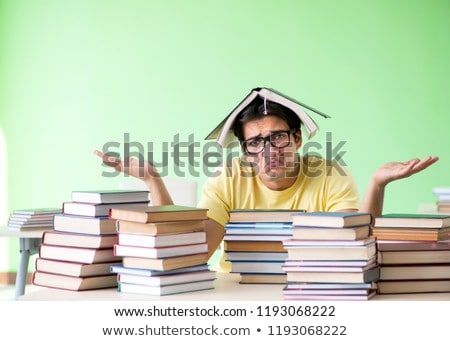 Zdjęcia stock: Student With Too Many Books To Read Before Exam