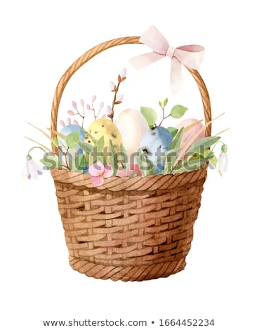 Stock photo: Easter Eggs In A Wicker Basket And Snowdrops