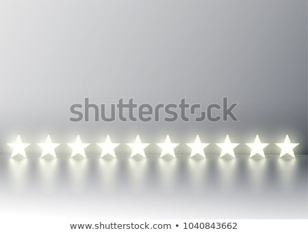 Foto stock: Ten 3d Yellow Glowing Star Rating On Grey Background Vector Ill