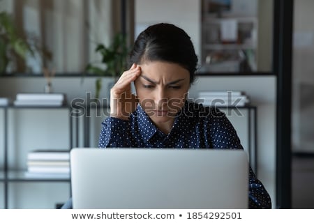 Stok fotoğraf: Business Woman Reading Bad News At Laptop